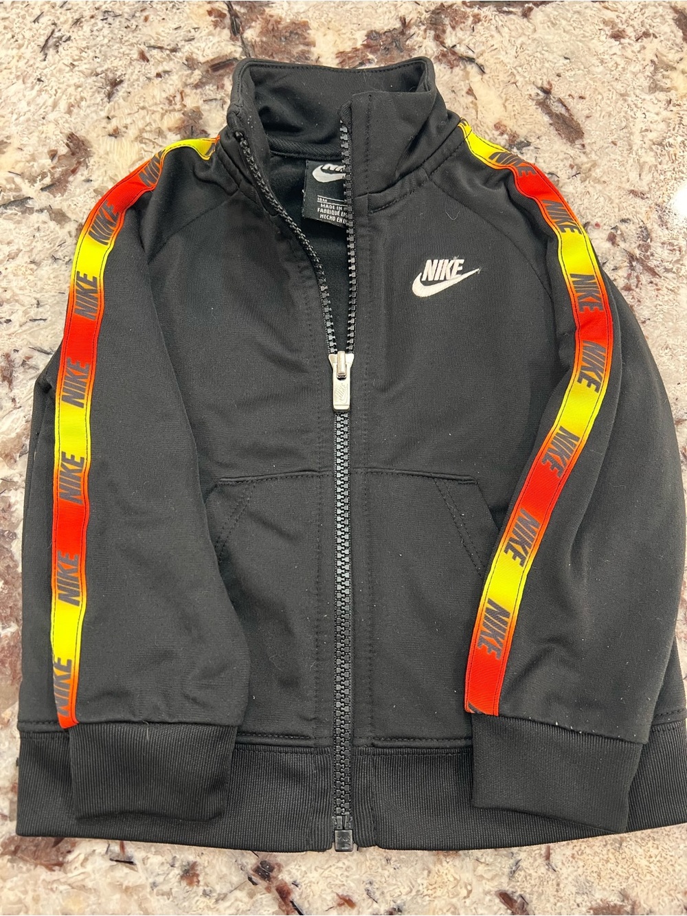 Nike Black Zip-Up Track Jacket with Red-Yellow Stripe